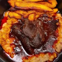 Ewa Agoyin & Plantain served with Beef or Fish