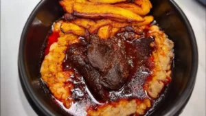 Ewa Agoyin & Plantain served with Beef or Fish